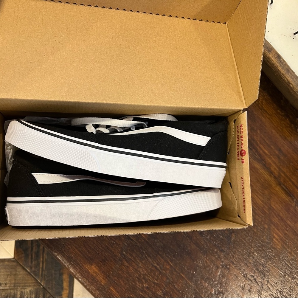 Vans Black and White Sneakers